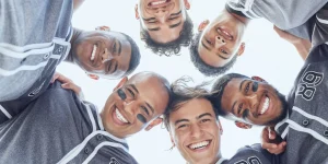 Sport, baseball and team huddle portrait for game mental preparation together with cheerful smile. .